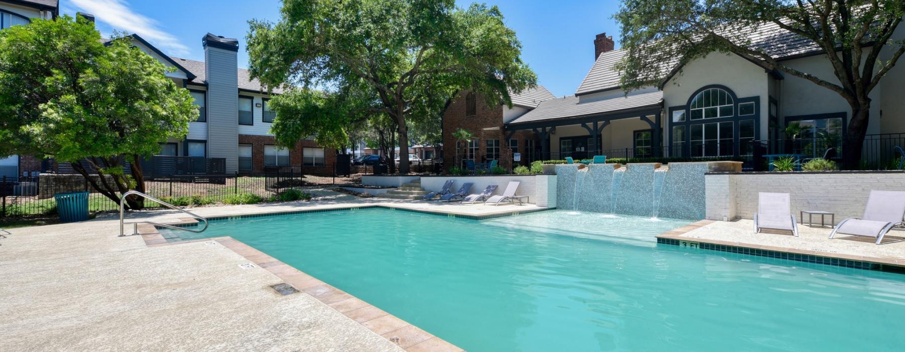 Sparkling swimming pool a swimming pool in front of a building