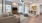 a living room with a wood floor a couch and a dining table
